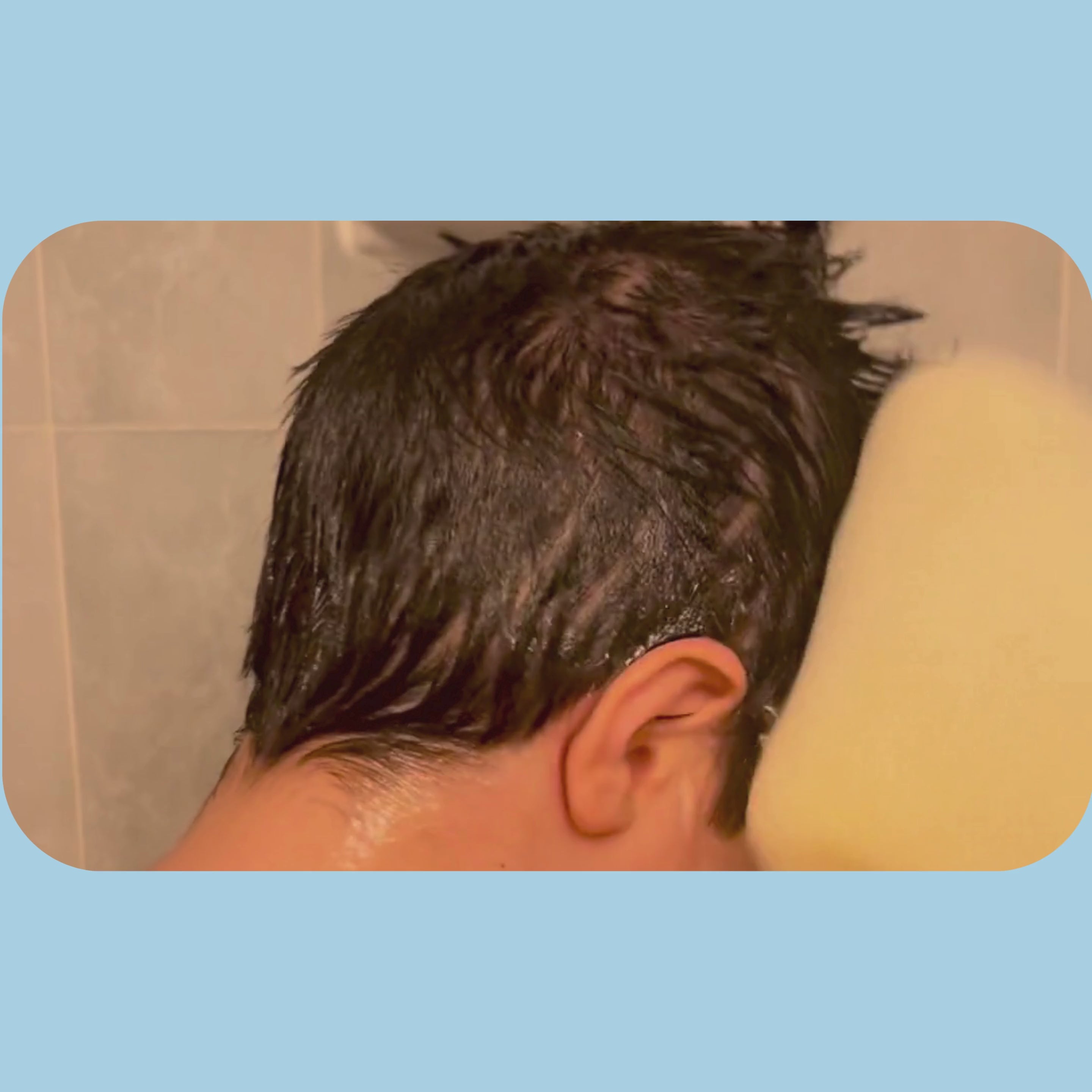 Load video: Steps of a mom showing her son how to use the different products offered by Clean + Comfort. They're reading a social story, using a checklist, and a shower decall